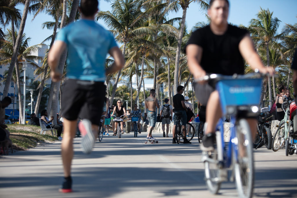 South Miami Beach Ocean Drive Miami Beach Boardwalk Citi Bike People Bicycling Biking Exercising Skateboarding Sunny 20180325 066